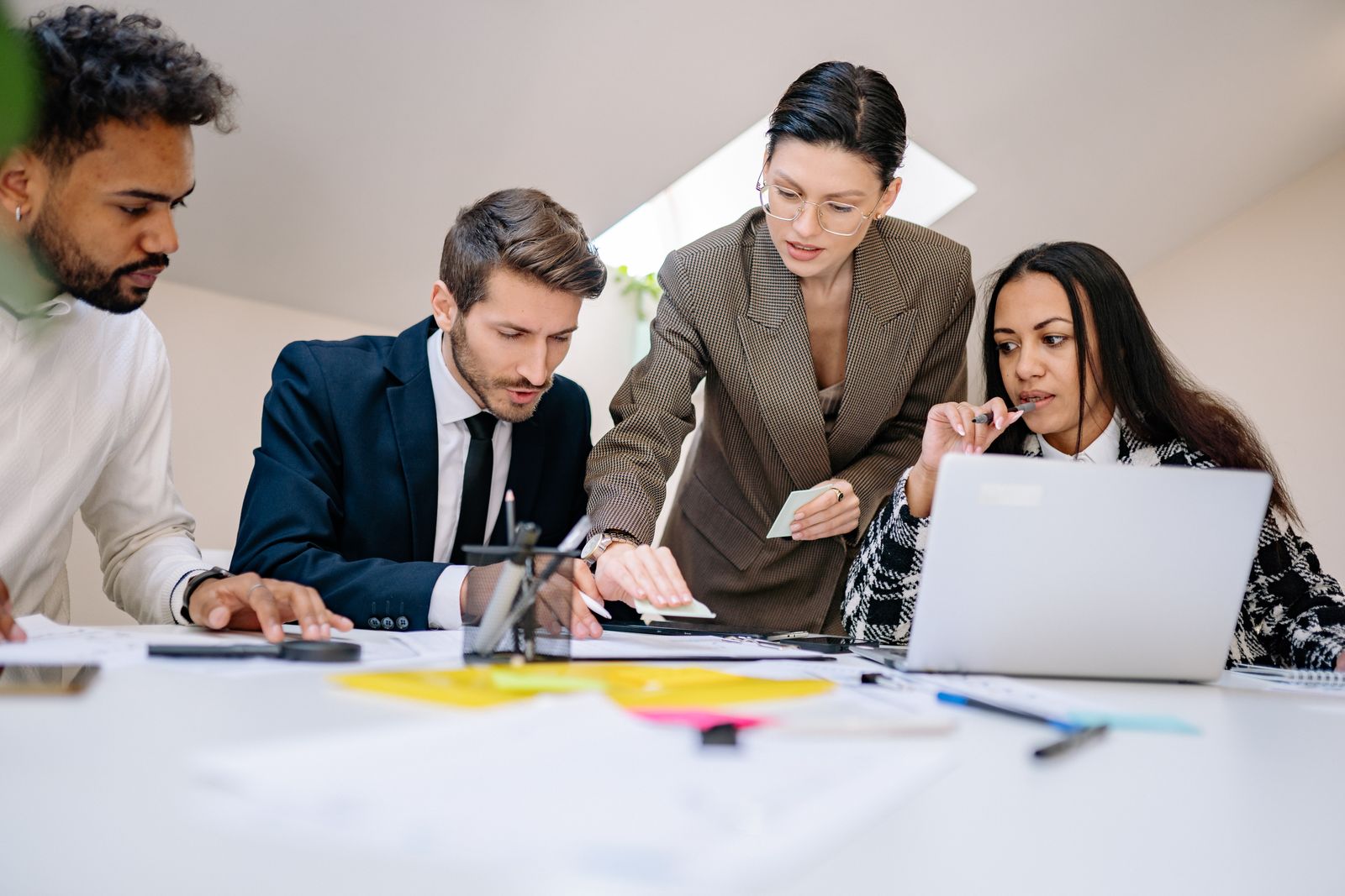 Business professionals reviewing current contractor records